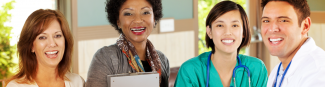 A diverse group of healthcare providers smiling