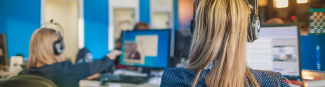 A group of Customer Service Representatives on their computers at Express Scripts Canada